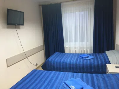 Двухместный номер эконом-класса с 2 отдельными кроватями — фото 4