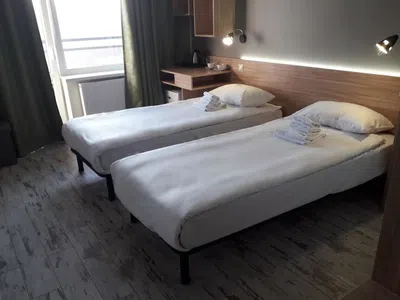 Улучшенный двухместный номер с 2 отдельными кроватями — фото 2
